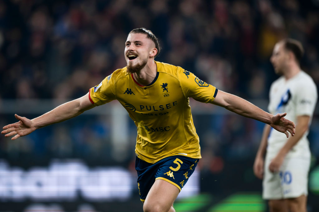 Radu Dragusin (L) of Genoa CFC celebrates after scoring a