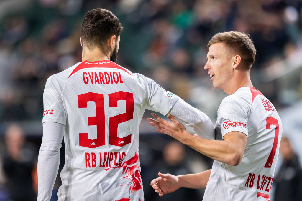Josko Gvardiol (L) and Dani Olmo (R) of RB Leipzig celebrate