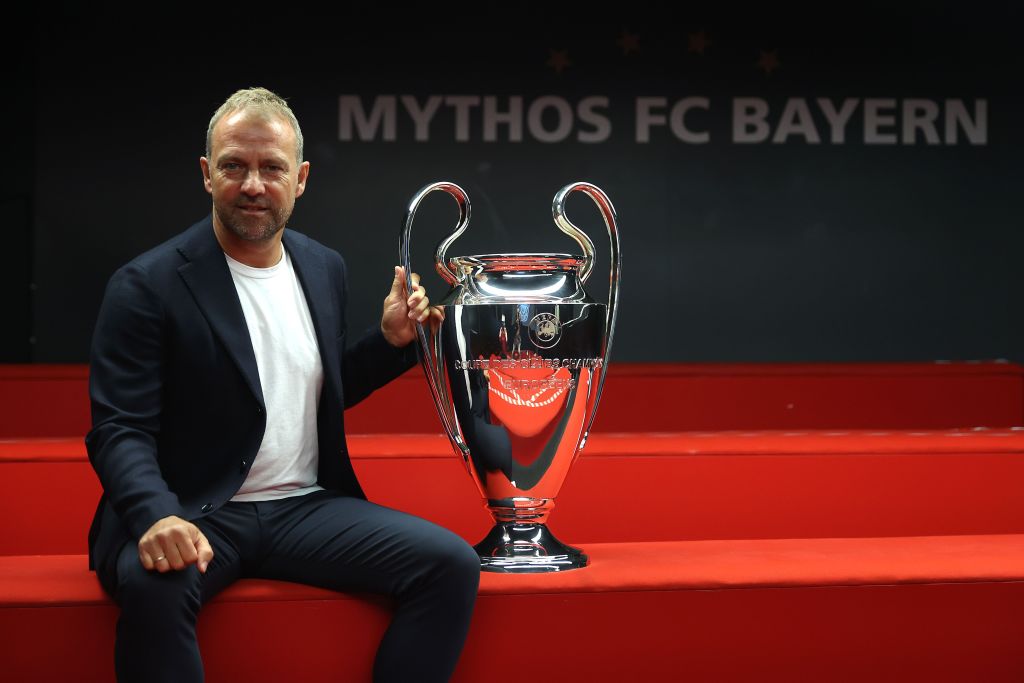 Hans-Dieter Flick Hands Over UEFA Champions League Trophy To FCB Museum